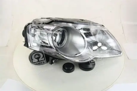 Фара прав. VW PASSAT B6 05- TYC 20-A733-05-2B